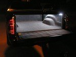 Beefy LED Strips Here's a shot of my pickup with the top down at night.  These lights are just what I wanted. I can see whatever I decide to throw in the bed.