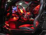 High Intensity LED Spotlight  Red LED spot lights under the seats aimed at the door panels and lower dash pieces also in both sun visors lighting up top of dash.